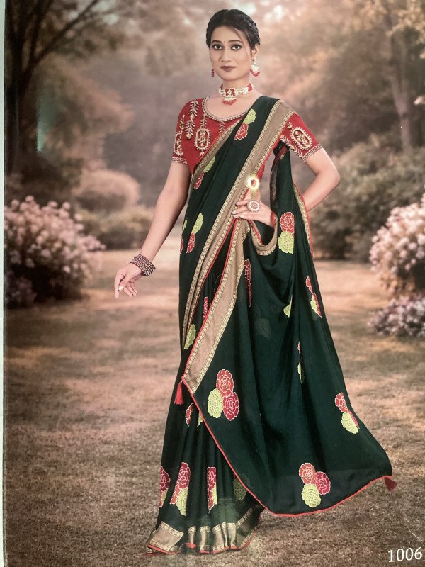 Shanvi- Embroidered georgette saree featuring floral motifs and a coordinating embroidered blouse